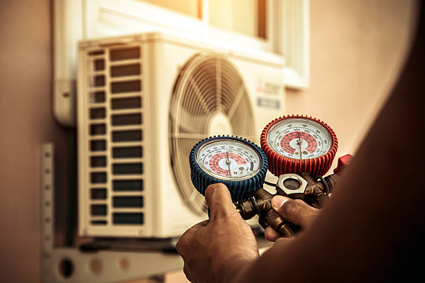 Professional Ac Installation technician working in Washington Grove, MD